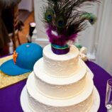 peacock topper on wedding cake