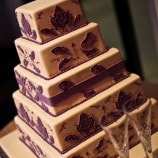 5 tier cake with purple details